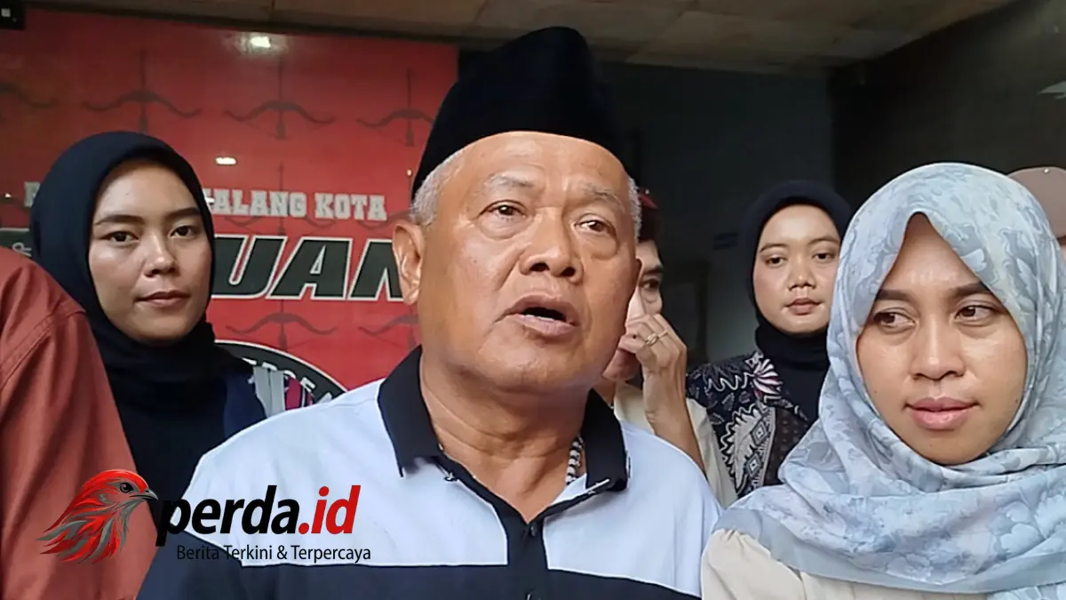 Foto Yai Mim tersangka kasus pornografi eks dosen UIN Malang saat di Polresta Malang.